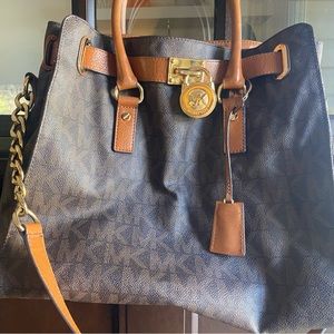 Brown monogram Michael Kors  Tote with chain over shoulder handle